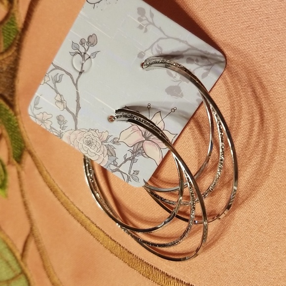 New large silver hoop earrings. - Picture 2 of 6